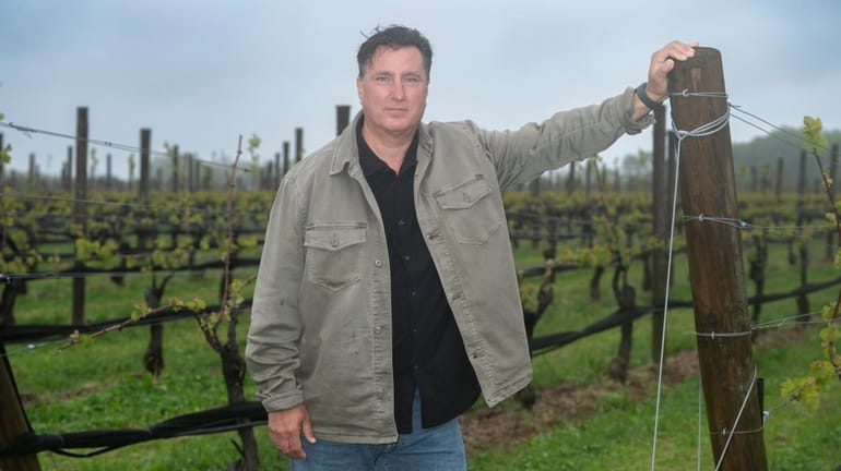 Dr. John Fondacaro poses by the vines at Lieb Cellars in...