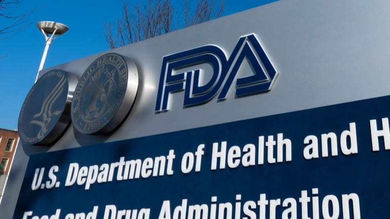 A sign for the U.S. Food and Drug Administration is...