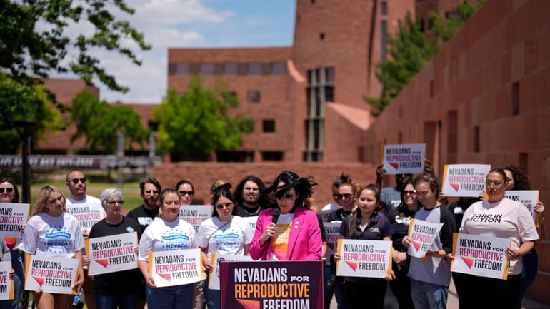 FILE -Lindsey Harmon, President, Nevadans for Reproductive Freedom, speaks during...
