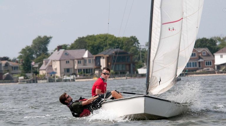 Narrasketuck Yacht Club members race their vintage sailboats in a regatta...