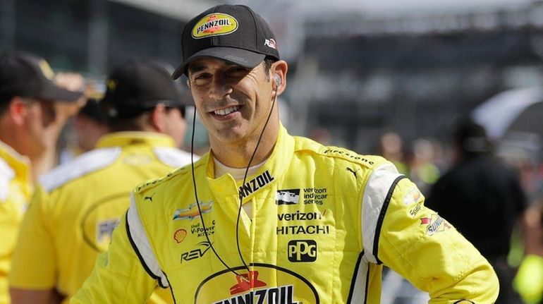 Helio Castroneves waits during qualifications for the Indianapolis 500 at...