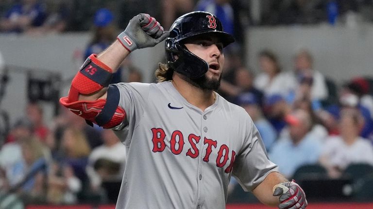 Boston Red Sox's Wilyer Abreu celebrates after hitting a home...