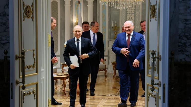 Russian President Vladimir Putin, left, and Belarusian President Alexander Lukashenko...