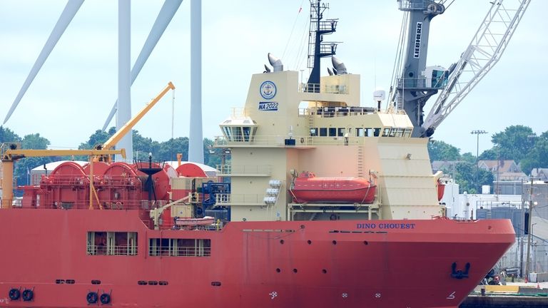 The Dino Chouest, an offshore supply ship, is docked at...