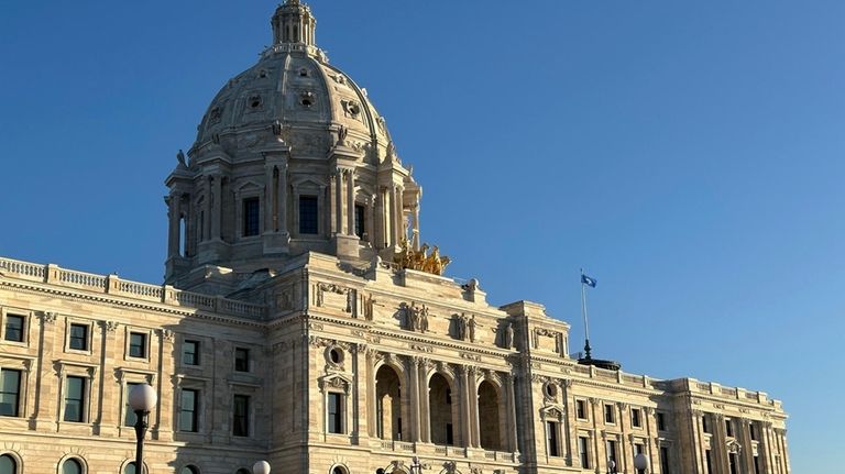 The sun shines on the Minnesota State Capitol on Monday,...