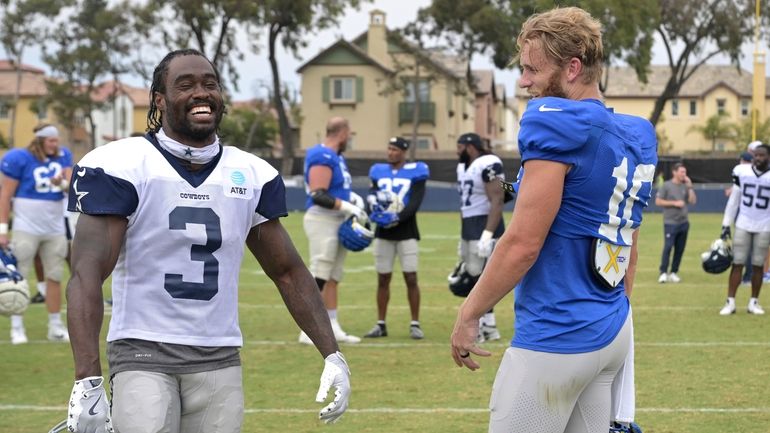 Dallas Cowboys wide receiver Brandin Cooks, left, and Los Angeles...