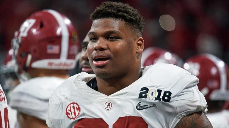 Alabama Crimson Tide defensive lineman Quinnen Williams looks on during...