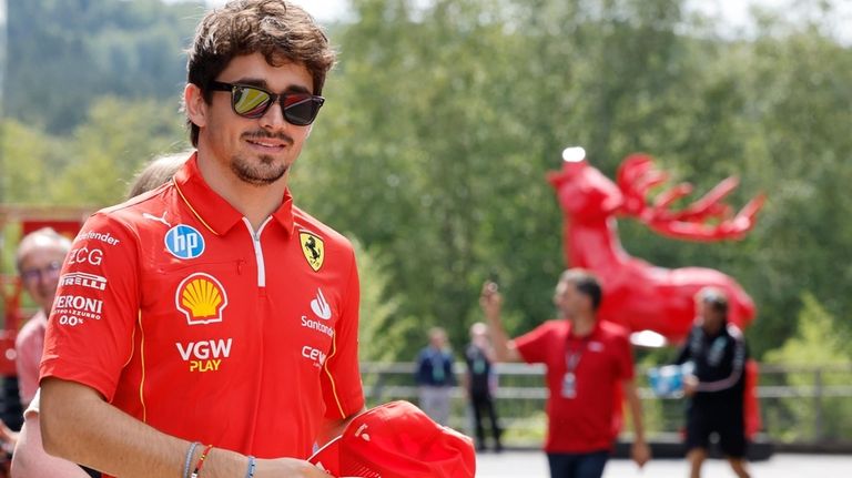 Ferrari driver Charles Leclerc of Monaco arrives in the paddock...