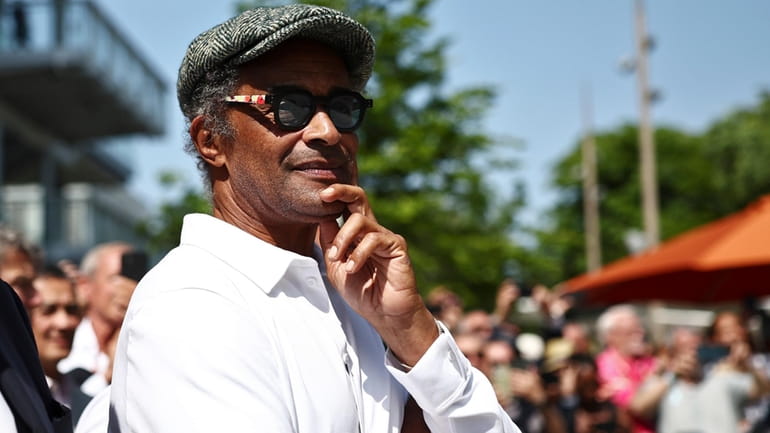 Former French tennis player Yannick Noah attends the inauguration of...