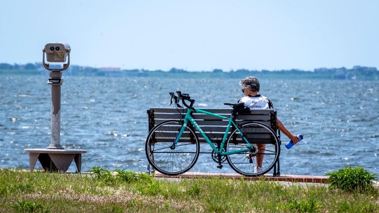 A woman takes in the view overlooking the Great South...