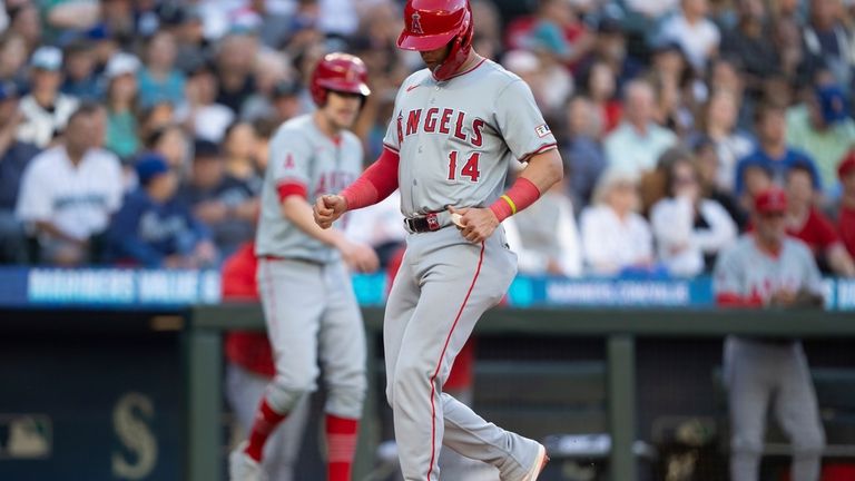 Los Angeles Angels' Logan O'Hoppe scores a run on a...