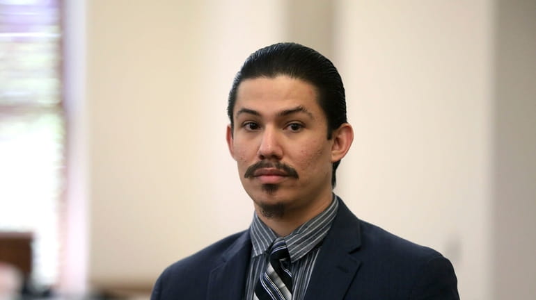Anthony Martinez watches as the jury members leave the courtroom...