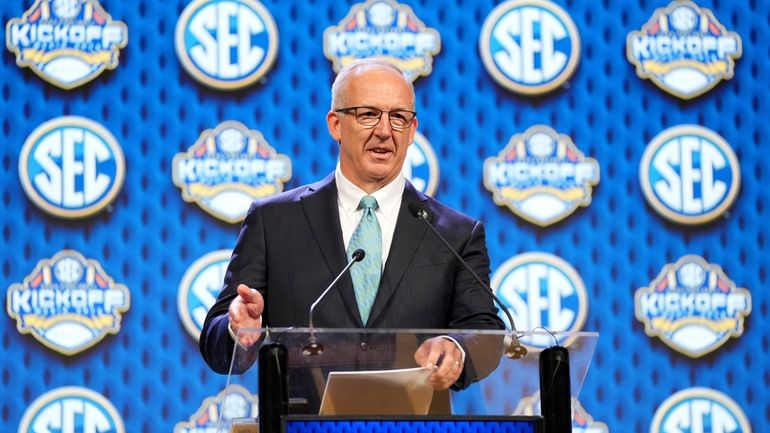 Southeastern Conference commissioner George Sankey speaks during SEC NCAA college...