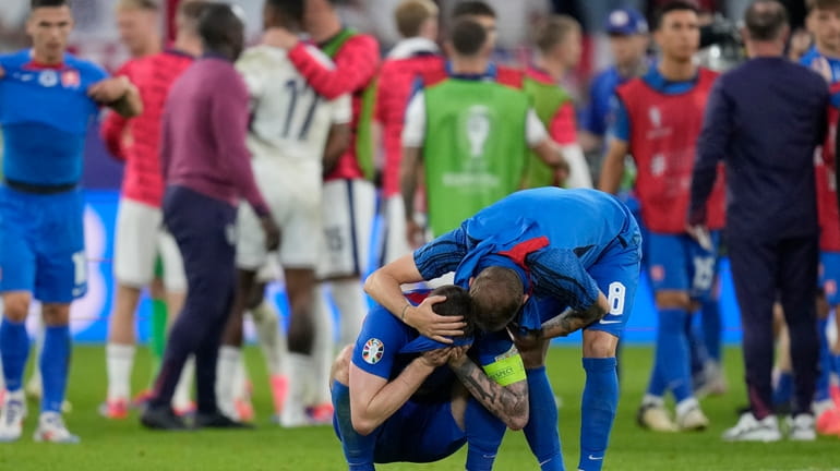 Slovakia players react disappointed after a round of sixteen match...