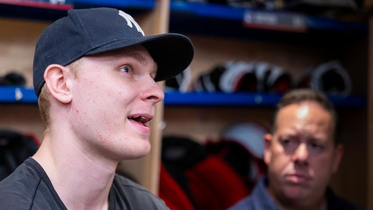 Kaapo Kakko speaks during Rangers break-up day media availability on Tuesday...