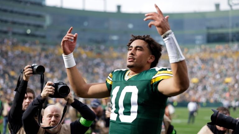 Green Bay Packers quarterback Jordan Love (10) celebrates after an...