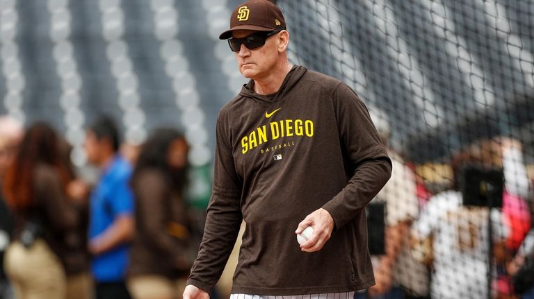 San Diego Padres third base coach Matt Williams takes part...