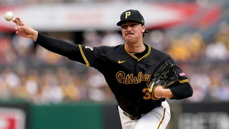 Pittsburgh Pirates starting pitcher Paul Skenes delivers during the second...