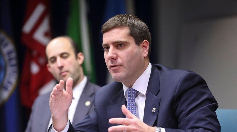 Acting Suffolk County Police Commissioner Tim Sini attends a meeting...