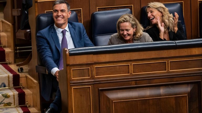 From left to right: Spain's Socialist Prime Minister Pedro Sanchez,...