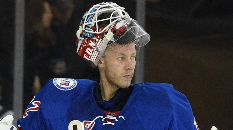 New York Rangers goalie Antti Raanta looks on from the...