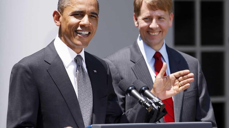 President Barack Obama introduces former Ohio Attorney General Richard Cordray...