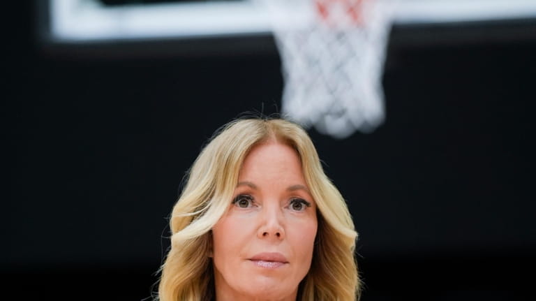 Los Angeles Lakers owner Jeanie Buss listens to JJ Redick...