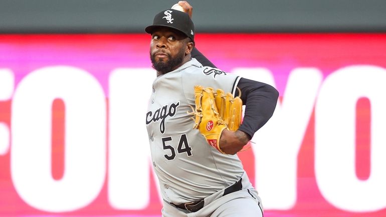 Chicago White Sox relief pitcher Touki Toussaint delivers against the...