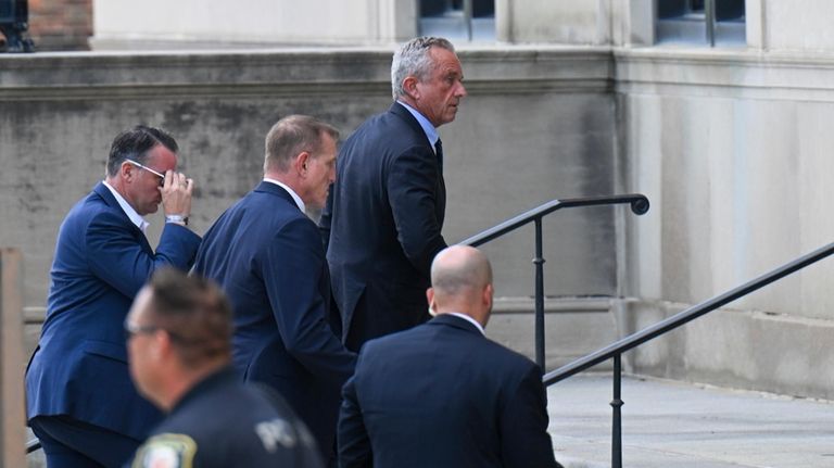 Independent presidential candidate Robert F. Kennedy Jr., top, arrives at...