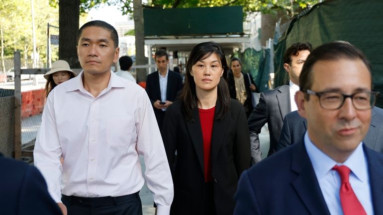 Attorney Seth DuCharme walks in front of former New York...