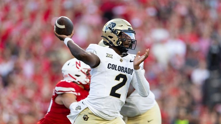 Colorado quarterback Shedeur Sanders (2) passes the ball against Nebraska...