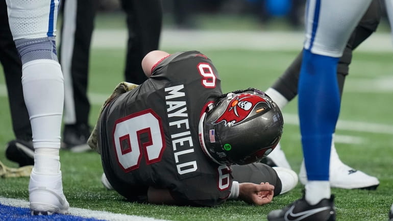 Tampa Bay Buccaneers quarterback Baker Mayfield (6) lays on the...
