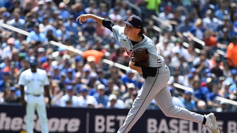 Detroit Tigers starting pitcher Reese Olson (45) throws to a...