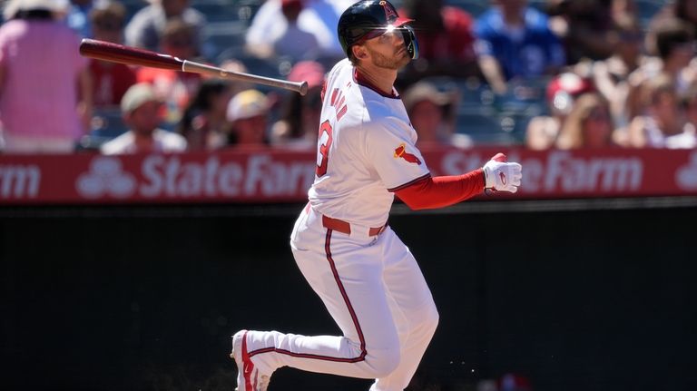 Los Angeles Angels' Taylor Ward tosses his bat after hitting...