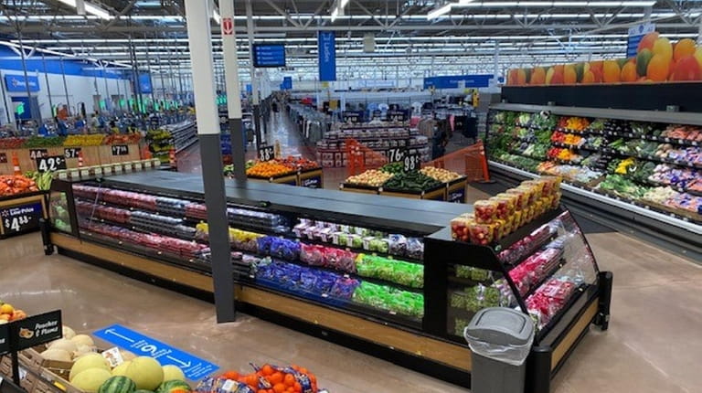 The newly expanded Walmart store in Farmingdale includes features such as a grocery store...