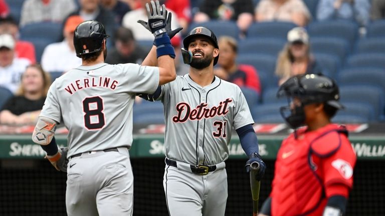 Detroit Tigers' Matt Vierling (8) and Riley Greene (31) celebrate...