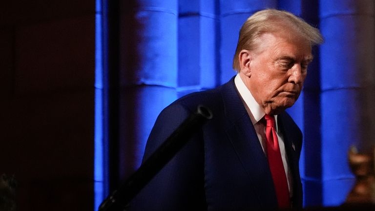 Republican presidential nominee former President Donald Trump arrives to speak...