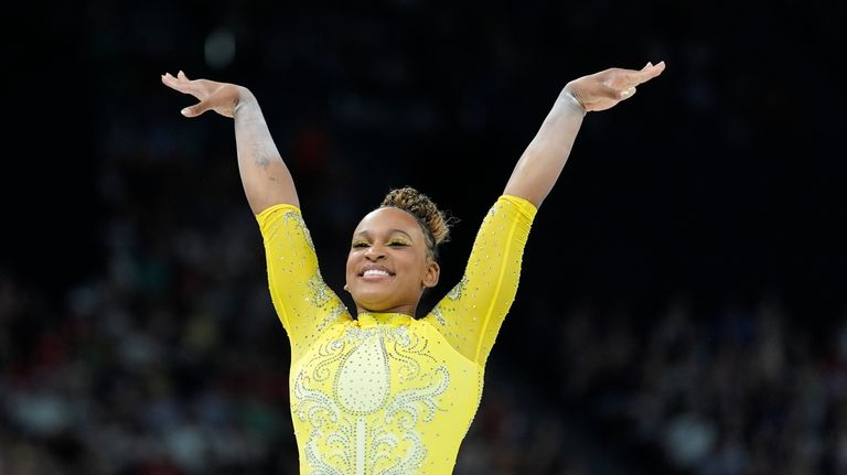 Rebeca Andrade, of Brazil, performs on the balance beam during...