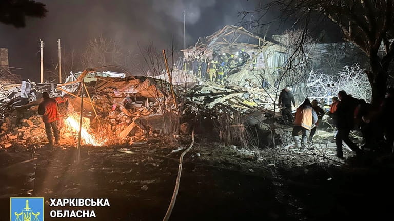 In this photo provided by Kharkiv Regional Prosecutor's Office, firefighters...