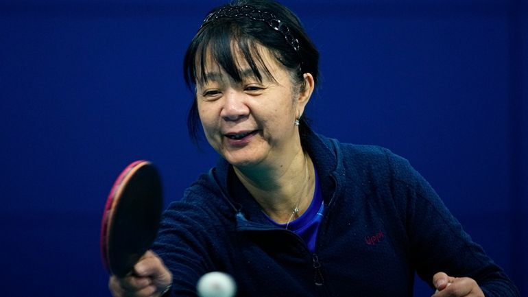 Table tennis player Zhiying Zeng trains at the National Olympic...