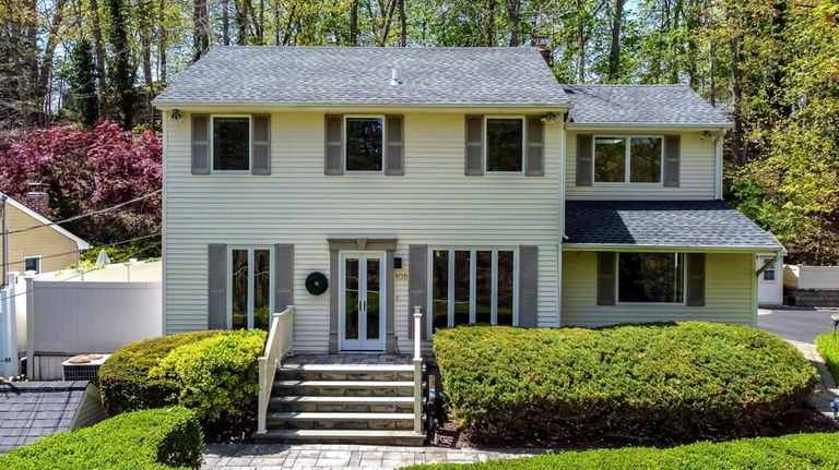 This $659,000 Northport home sits on a hilltop.