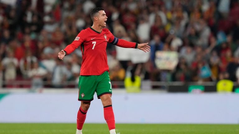 Portugal's Cristiano Ronaldo celebrates after the UEFA Nations League soccer...