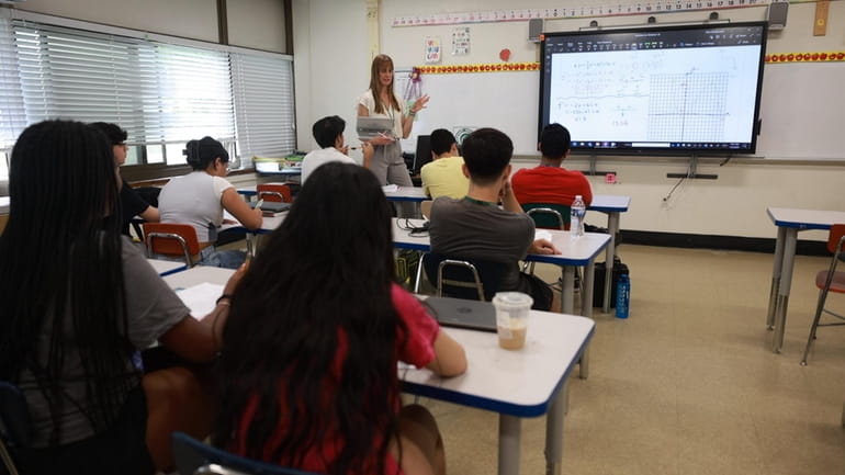 Dara Szwejkowski teaches an AP precalculus class at Valley Stream High...