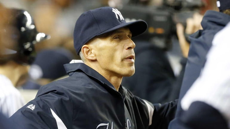 Joe Girardi looks on from the dugout during the fifth...