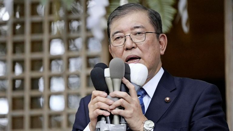 Japan's former Defense Minister Shigeru Ishiba announces his candidacy of...