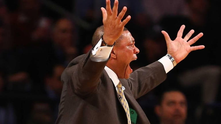 Doc Rivers of the Boston Celtics argues a call during...