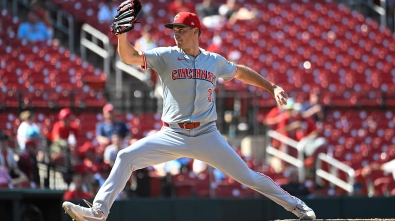 Cincinnati Reds relief pitcher Brent Suter throws in the ninth...