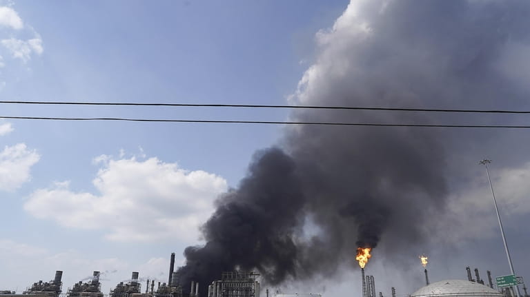 A fire burns at a Shell chemical facility in Deer...