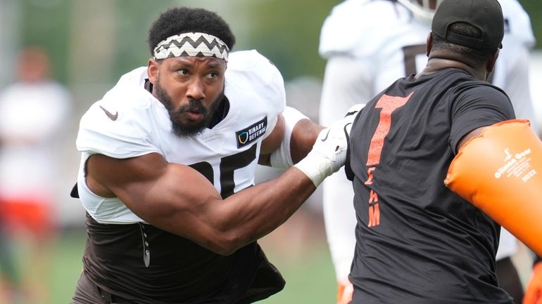 Cleveland Browns' Myles Garrett runs a drill during a joint...