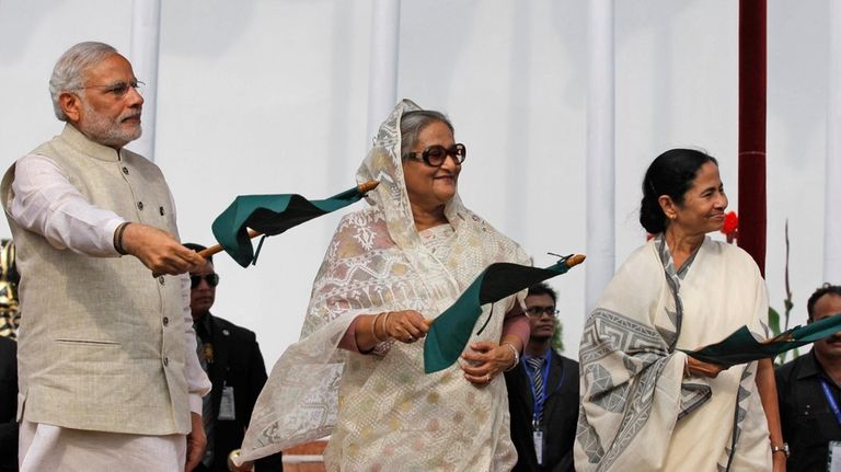 FILE- Indian Prime Minister Narendra Modi, left, Bangladesh's Prime Minister...